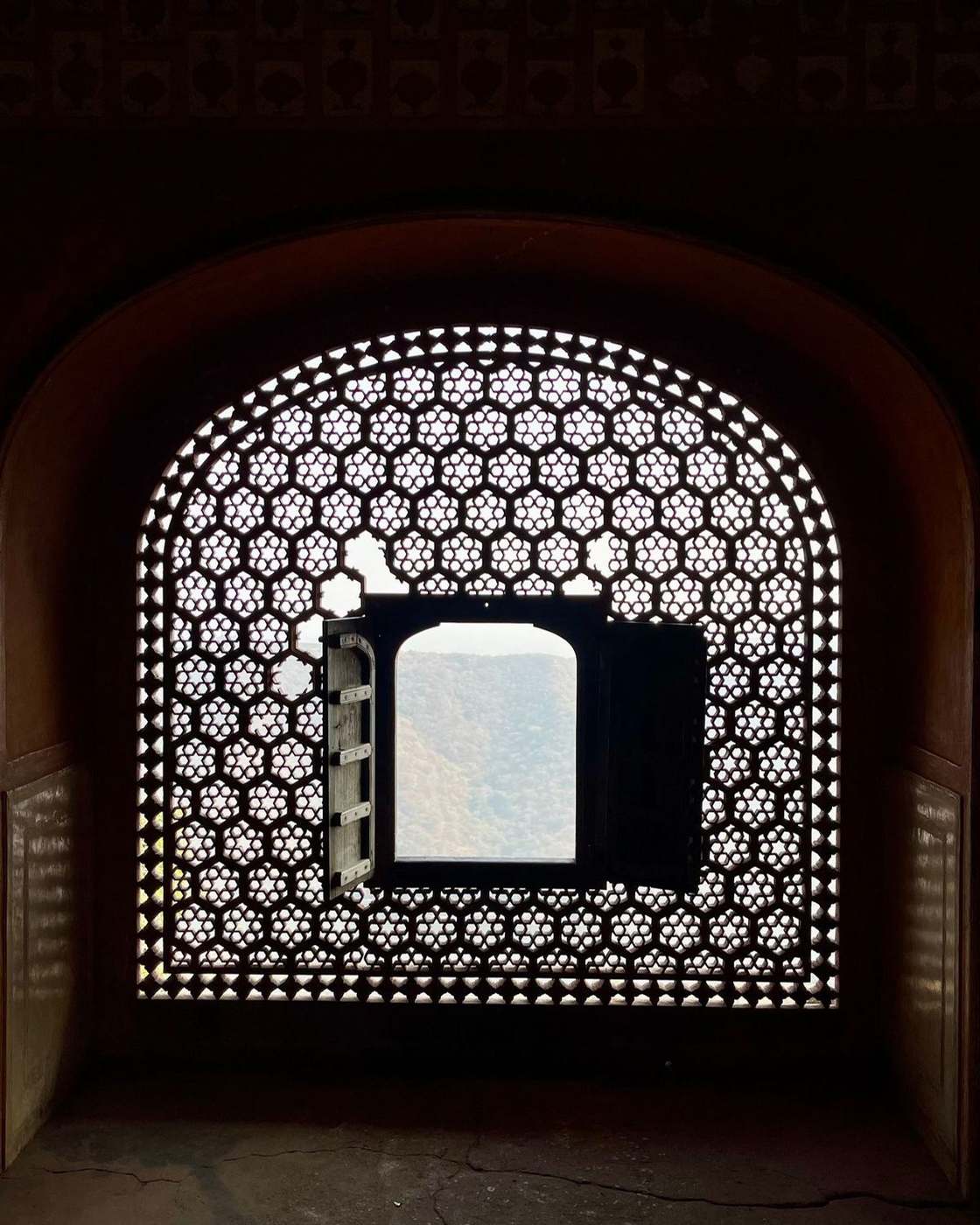 Backlit laser-cut jali window in a mandir, cut from 2 mm sheet