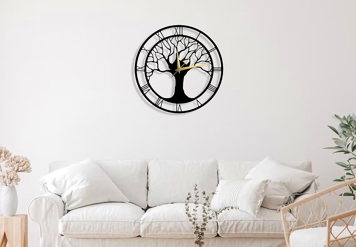 Metal wall clock on a plain living room wall